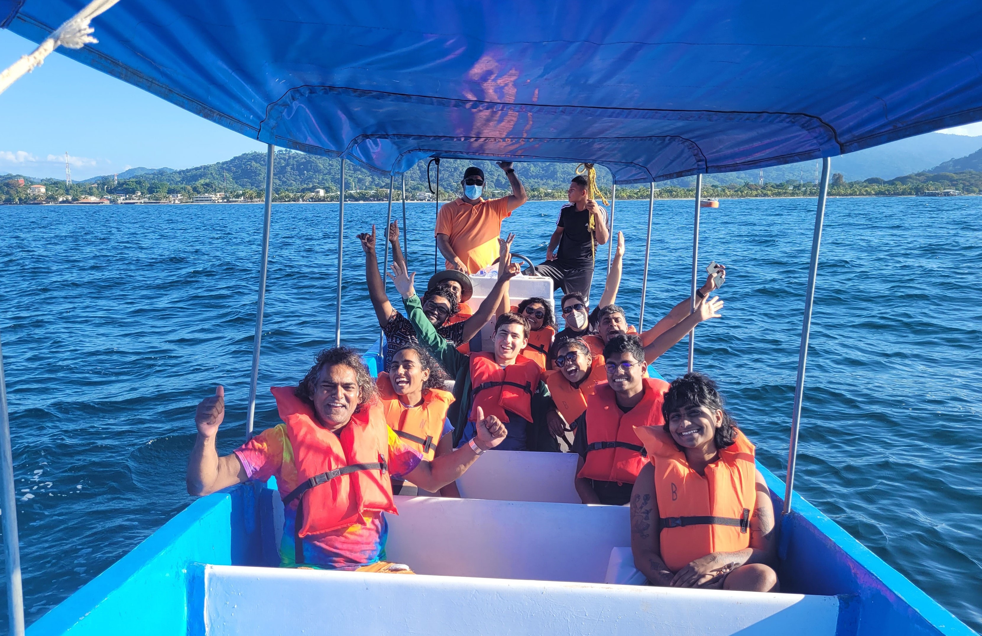 Group of visitors on a boat tour in Tela Bay, North Coast Honduras